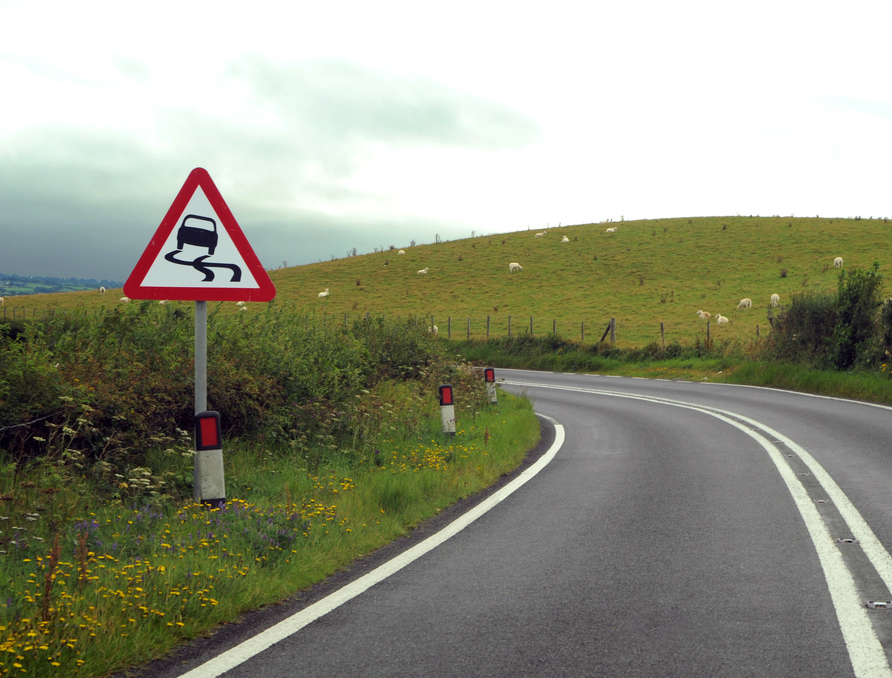 What hazard is shown in this road sign?