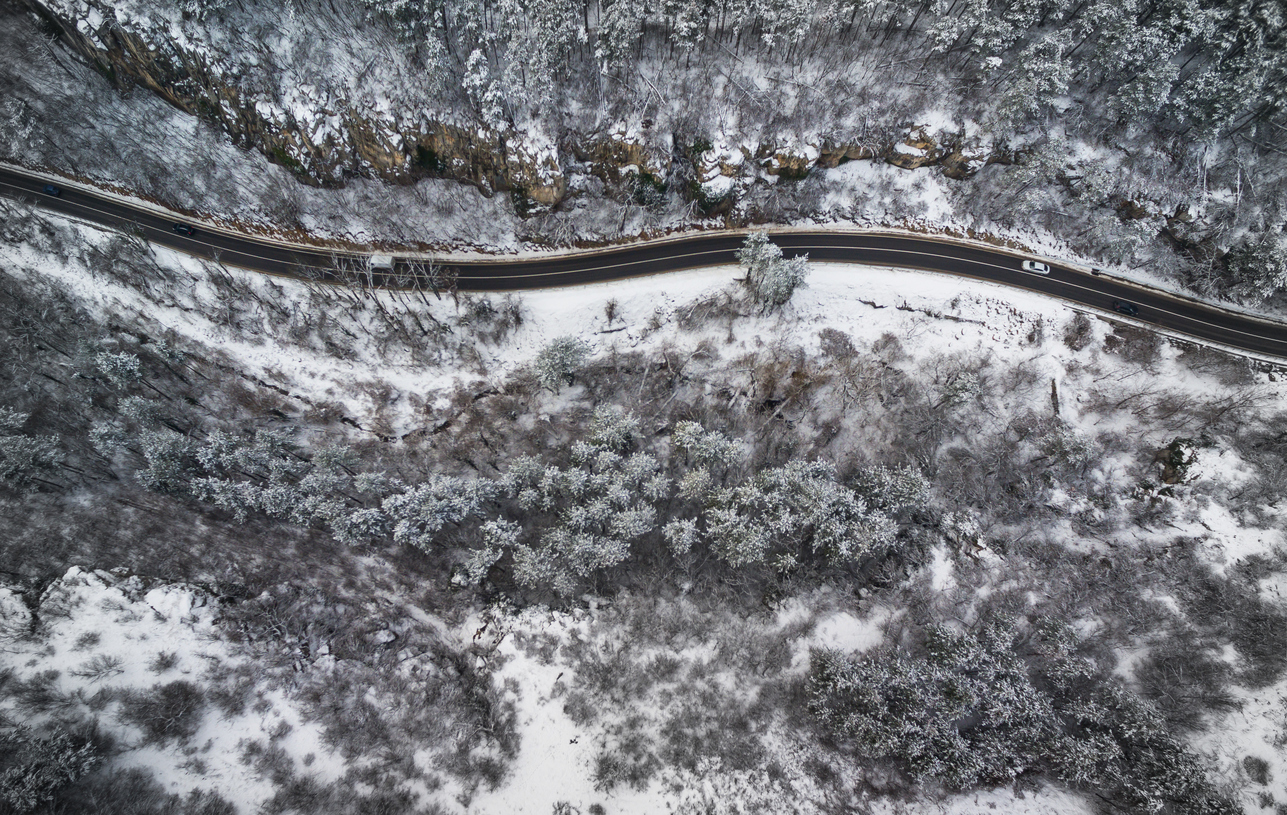 On a cold day, should you warm up a car's engine before driving?